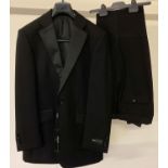 A brand new with original tags Milan Collection men's Tuxedo dinner suit.