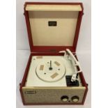 A vintage Dansett Tempo portable record player in red and cream.