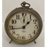 A 1920's metal cased Westclox Big Ben alarm clock with white face.