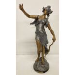 An Art Nouveau style cast metal figure of "Diane" painted in gold, bronze and pewter.