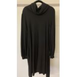 A long sleeve black jersey roll neck swing dress by Jaeger size 14.