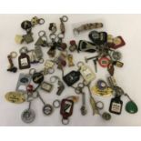 A collection of vintage brewery advertising, sporting , tools and penknife key rings.