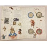 A Great British Coin Hunt card folder containing a set of 2017 Beatrix Potter 50p coins.