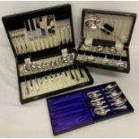 3 boxed vintage silver plated cutlery sets.
