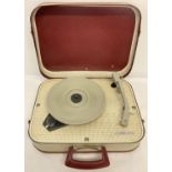 A vintage Fidelity valve record player, HF31, in cream and red portable carry case.