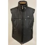 A men's Burberry Black Label lightly padded gillet with Burberry check lining.