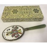 A vintage Chinese jade handled small vanity mirror with enamelled back depicting an oriental lady.