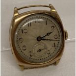 An early 20th century 9ct gold cased watch with engine turned face, in working order.