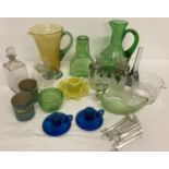 A collection of vintage glass ware. To include blue candlesticks and green Art Decco style carafe.