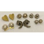 A collection of vintage clip-on earrings to include stone set, some with silver backs.