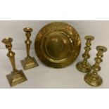 A collection of vintage brass ware items; 2 pairs of candlesticks together with a coronation plaque.