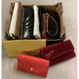 10 assorted vintage ladies clutch style handbags.