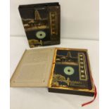 A boxed commemorative album celebrating the rebuilding of the Leifeng Pagoda.