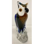 A heavy Murano style glass owl figurine in blue and brown colourway.