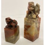 2 carved soapstone square shaped seals with carved foo dog finials.
