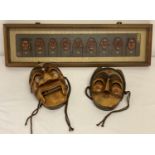 A wooden framed 3 dimensional Korean mask picture together with 2 carved wood Korean wall masks.