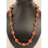 A 21" costume jewellery necklace with Venetian style glass beads & gold tone T bar clasp.