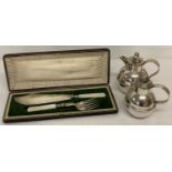 A cased set of fish servers with engraved decoration and mother of pearl handles.