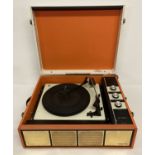 A vintage orange and cream Alba Golden disc portable record player model #437.