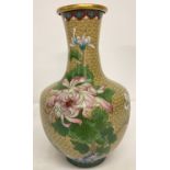An oriental cloisonné vase with chrysanthemum decoration of bulbous form.