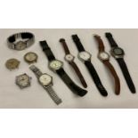 A quantity of assorted vintage wrist watches, with and without straps.