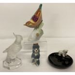 A Hollohaza Hungarian porcelain bird figure with bright colour decoration.