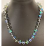 An 18" Australian crystal beaded necklace with white metal T bar clasp.