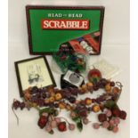 A box of assorted misc. items to include Christmas decorations, scrabble game and small watercolour.