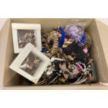 A box of mixed modern costume jewellery, some with original packaging.