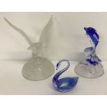 3 glass animal figures. A clear and frosted glass eagle.