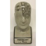 A ceramic L.N. Fowler phrenology head, with crazed glaze effect.