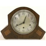 An Art Deco Westminster Chime wooden cased mantle clock. Complete with pendulum and key.