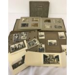 3 vintage photo albums containing 1920's and 1930's family photographs.