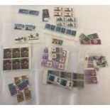 A quantity of loose vintage British commemorative and Centenary stamps.