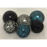A collection of 6 modern mosaic glass decorative balls.