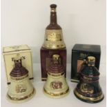 A collection of 4 Wade ceramic Bells whisky bell shaped decanters (empty).