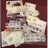 A quantity of Isle Of Man transport, racing and aviation collectors stamp sets and mini sheets.