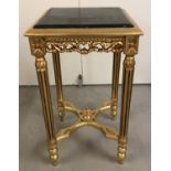 An ornamental gilt occasional table with square shaped marble insert to top.