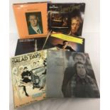 A collection of vintage classical, musical and comical LP's.