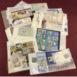 A collection of world stamp sets and mini sheets.