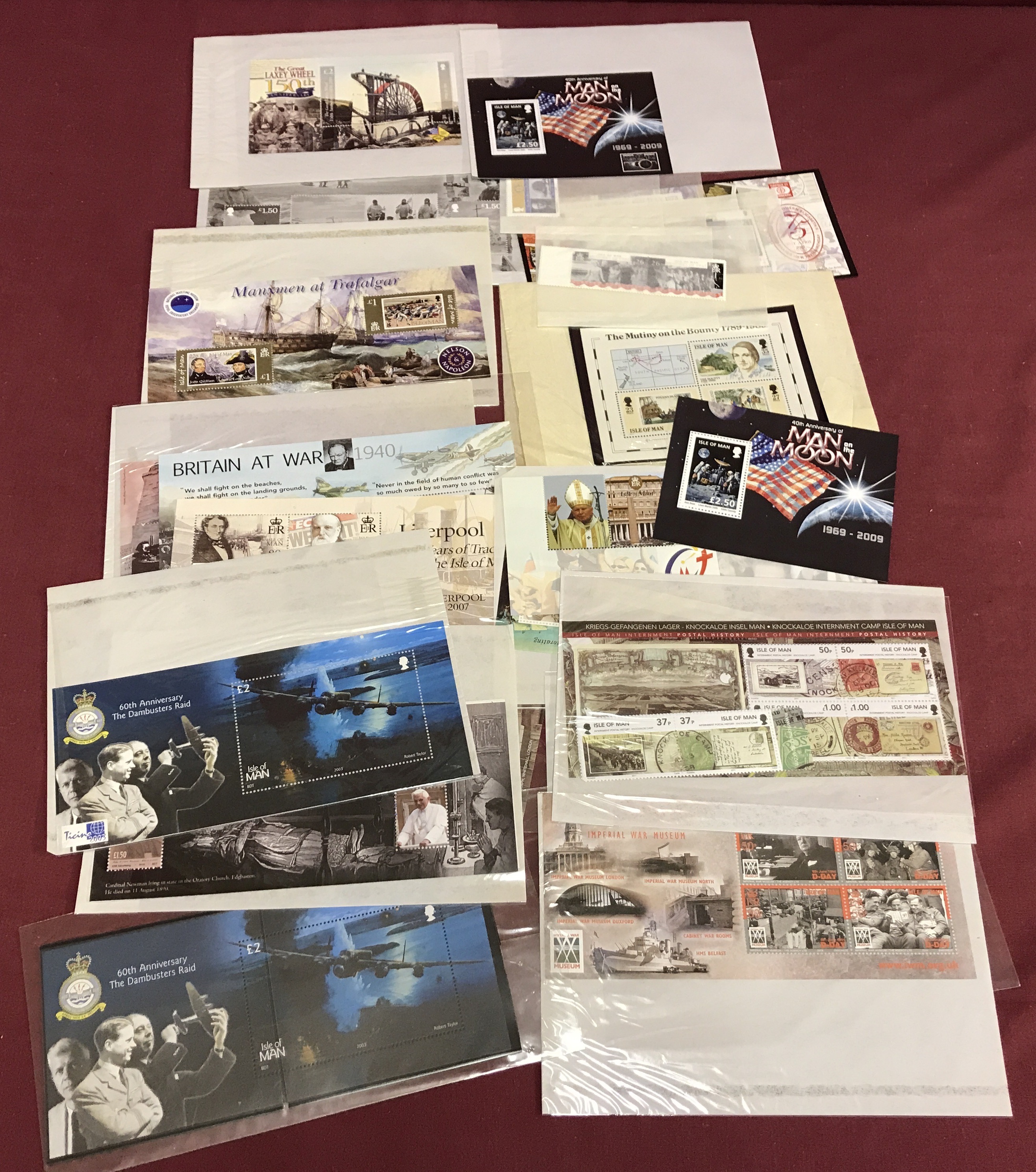 A quantity of Isle Of Man historical event collectors, mint stamp sets and mini sheets.