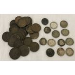 A tray containing 24 farthings and 13 three pence coins, to include silver issues.