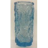 A large pale blue Whitefriars style art glass bark design vase.