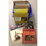 A tub of assorted vintage vinyl records to include Pop, Swing, Country and Comedy.