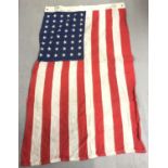 A WWII style US Marine Corps Stars & Stripes flag, Naval marked.