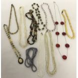 A quantity of vintage costume jewellery necklaces and beads.