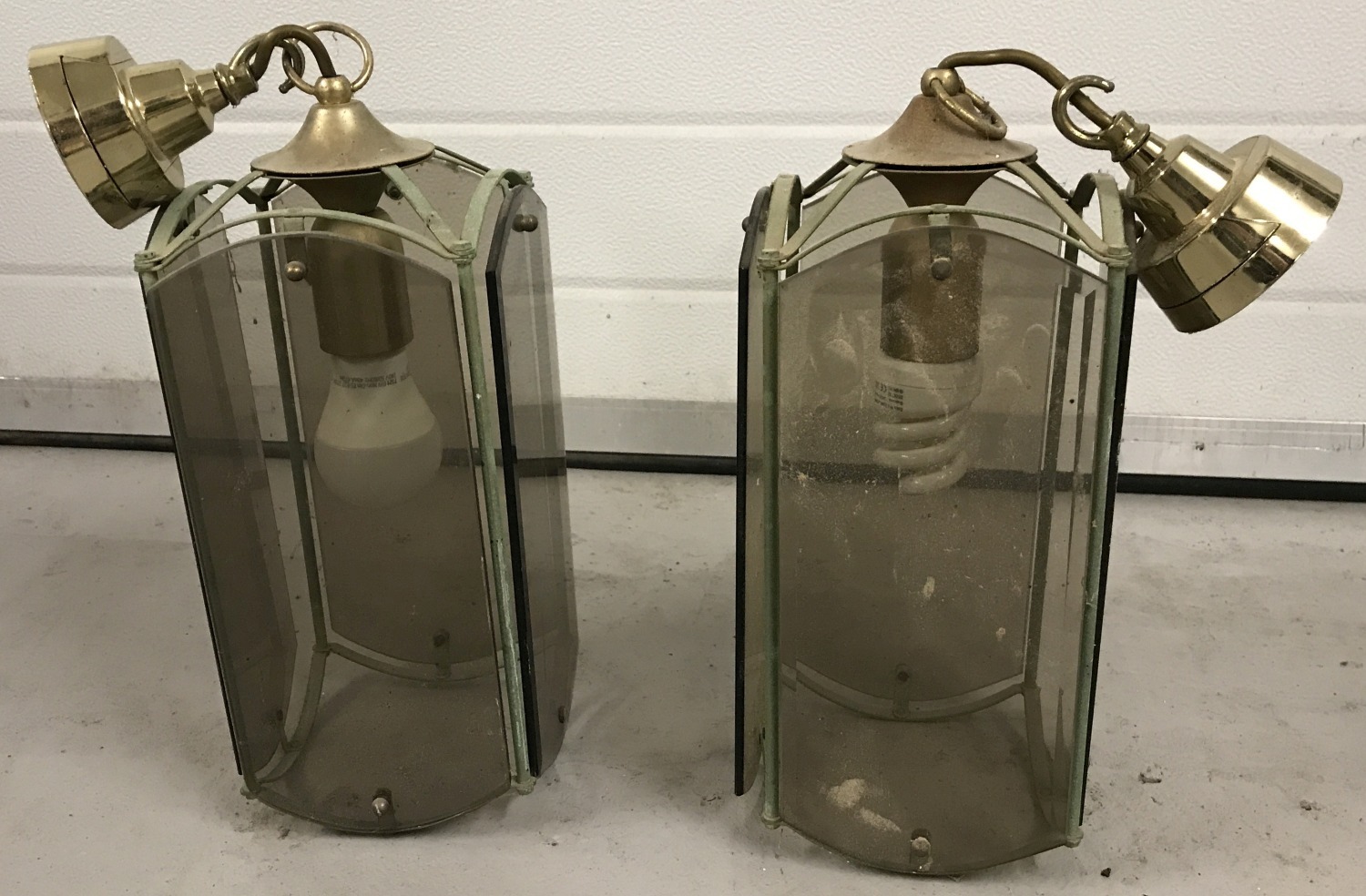 2 brass and smoked glass panel ceiling hanging lights.