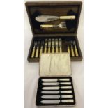 A set of vintage pearl handled fruit knives together with a wooden cased set of fish knives & forks