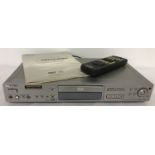 A vintage Sony DVP-S735D CD/DVD player with stainless steel casing.