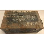 A Metal travel trunk, marked Lt. Sebbeare and dated 1942.